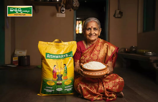 Elderly Indian Woman with Sri Aishwarya Foods Rice Bag at Home