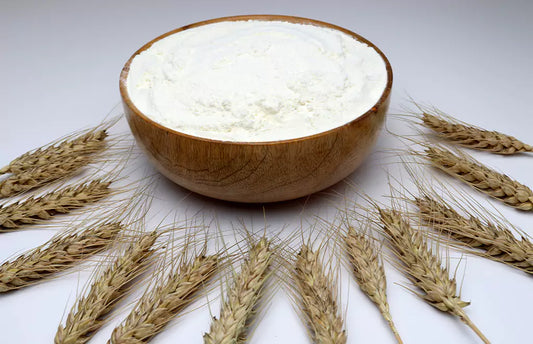 Rice Flour in a Bowl with Wheat Stalks
